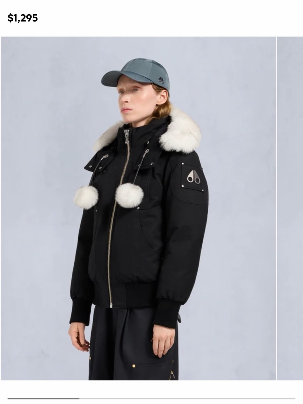 Moose Knuckles Black Bomber Jacket with White Fur Pom Trim
